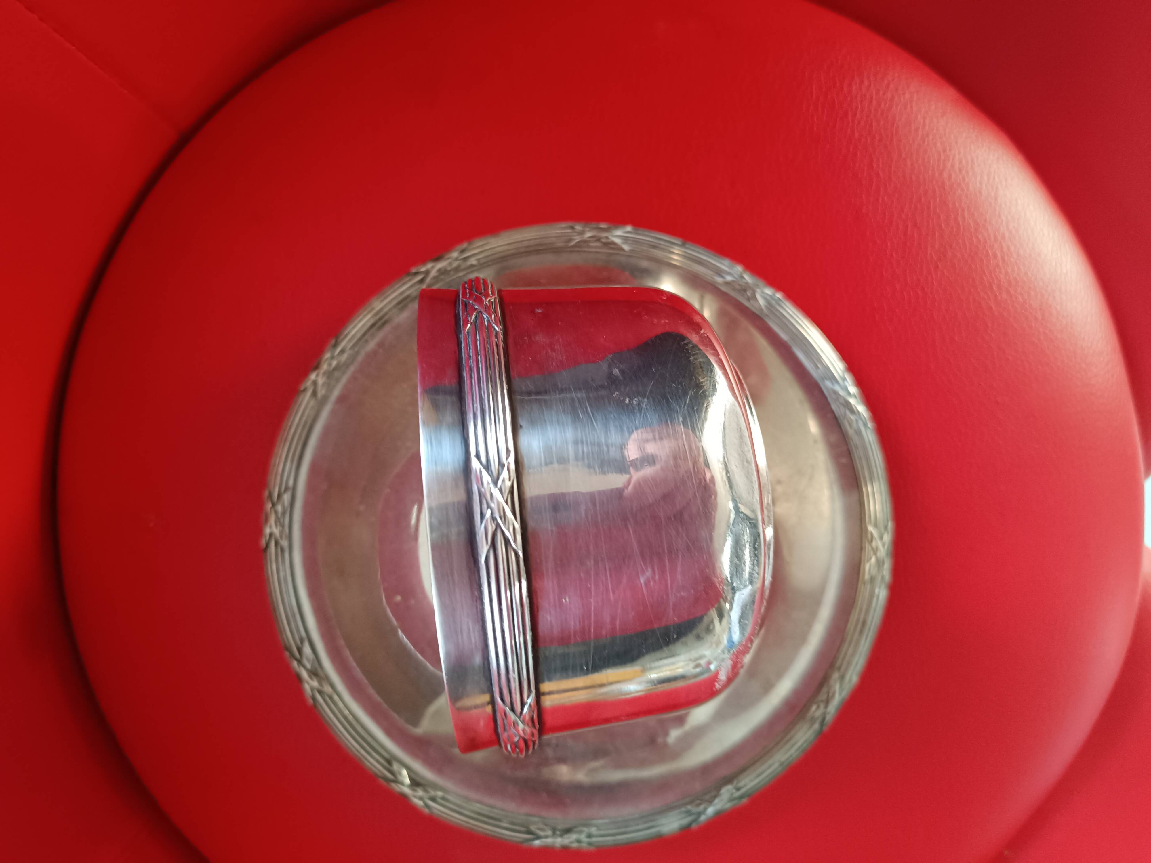 Silver-plated cup and saucer.