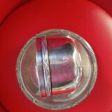 Silver-plated cup and saucer.