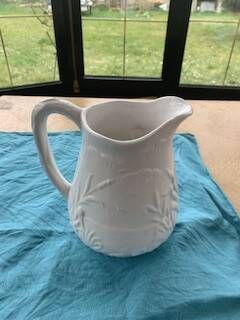 Carafe the heron in white glazed ceramic slipware.