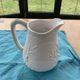 Carafe the heron in white glazed ceramic slipware.
