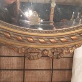 Louis XVI style oval beveled mirror