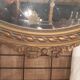 Louis XVI style oval beveled mirror