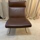 Brown leather lounge chair