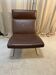 Brown leather lounge chair
