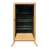 Restored antique oak display cabinet, black background, glass shelves.
