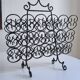 Wrought iron magazine rack 1960