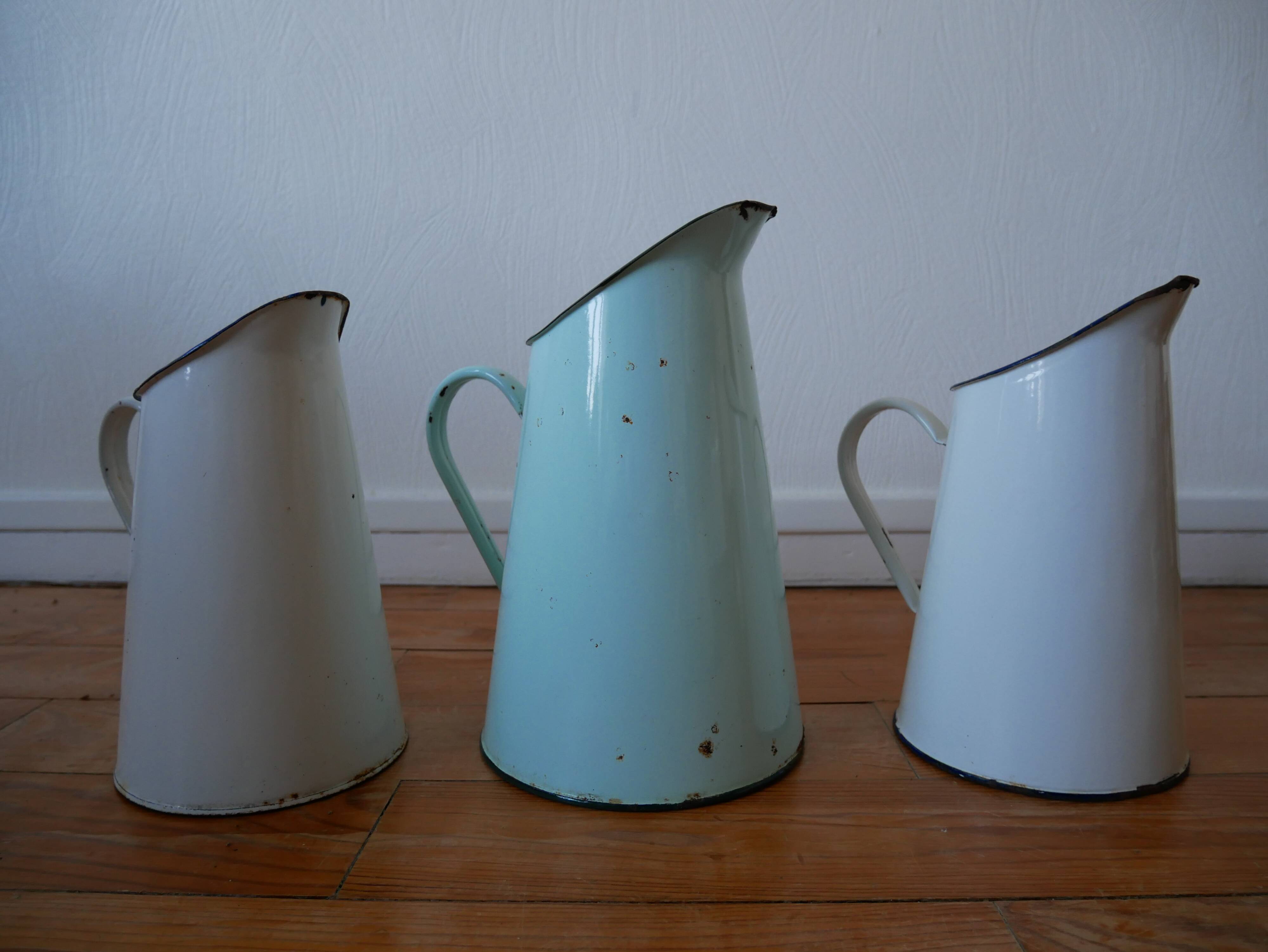 White enamelled metal broc