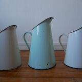 White enamelled metal broc