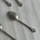 Set of 10 small silver metal spoons