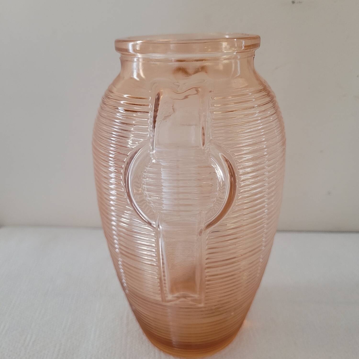 Salmon-colored Art Deco pressed glass vase