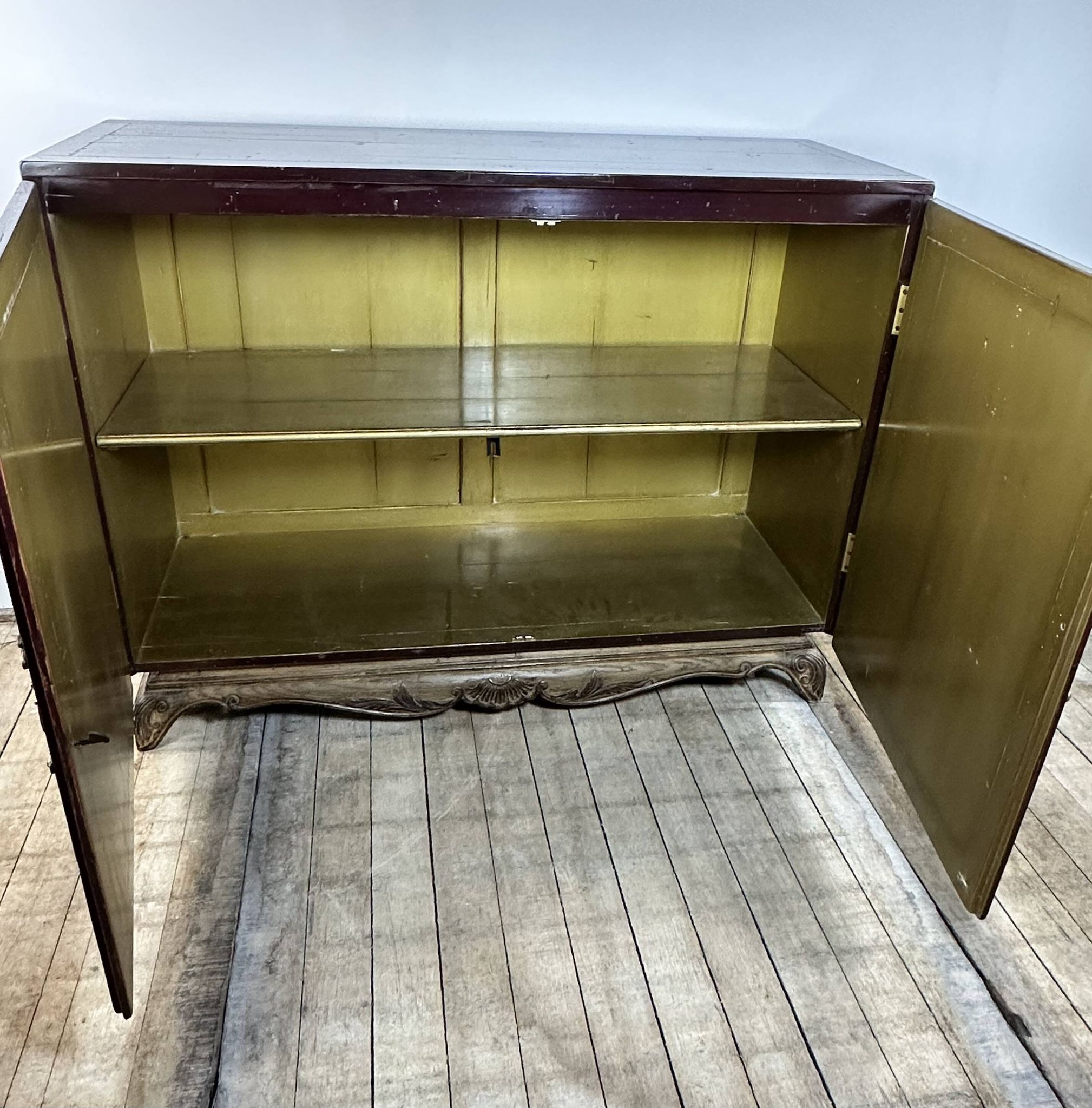 1950's lacquered wood and brass sideboard