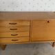 Row with drawers and bars