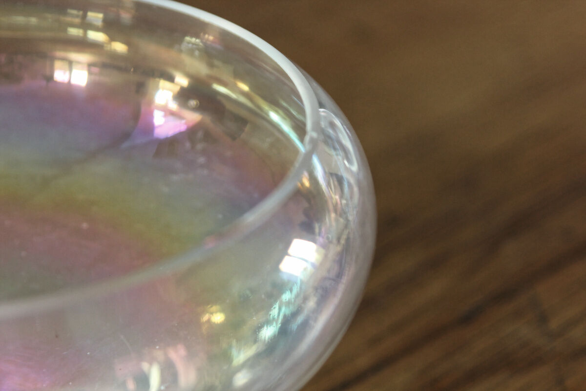 Old iridescent glass cup