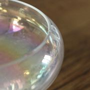 Old iridescent glass cup