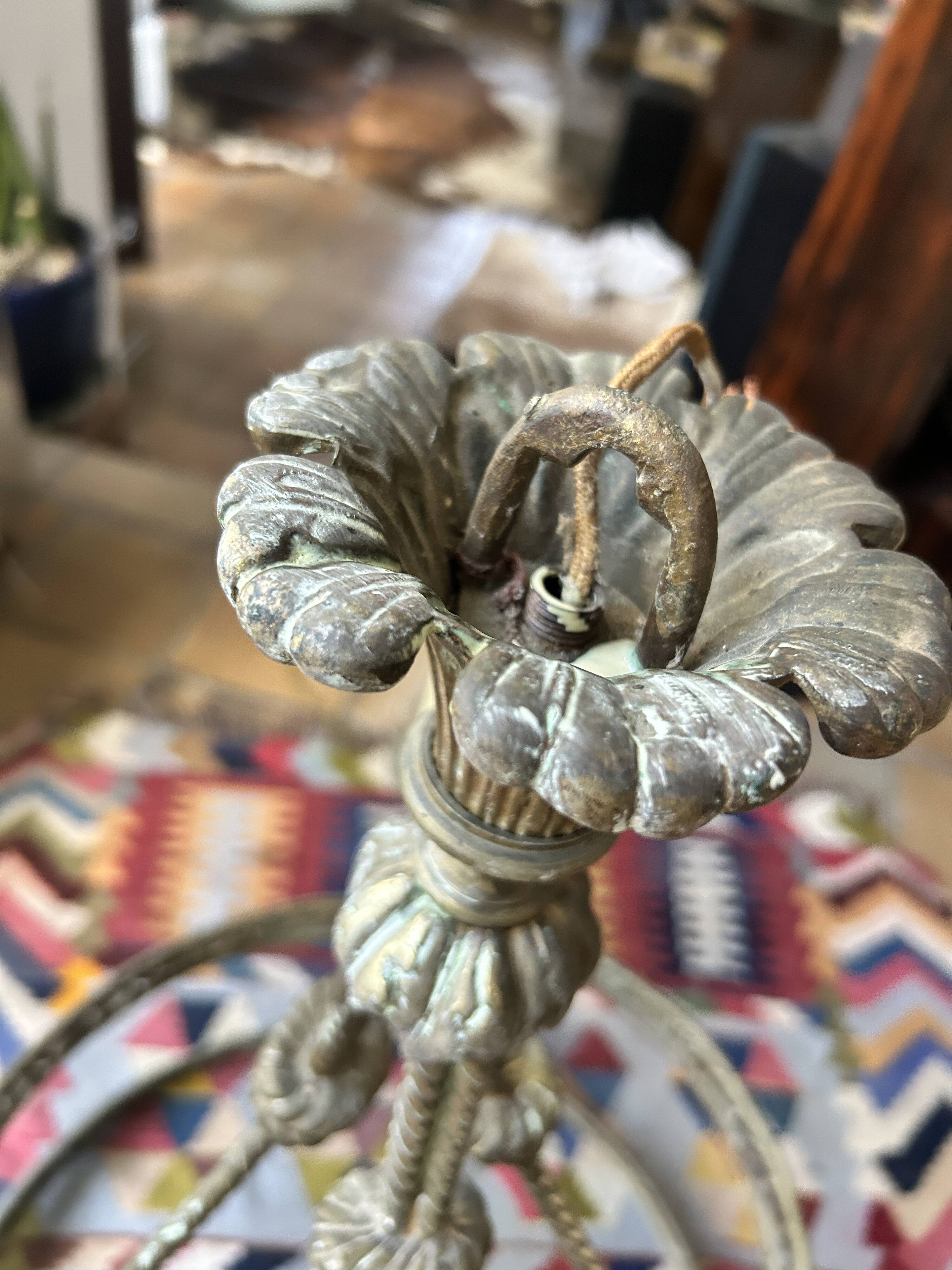 Brass chandelier from the early 20th century.