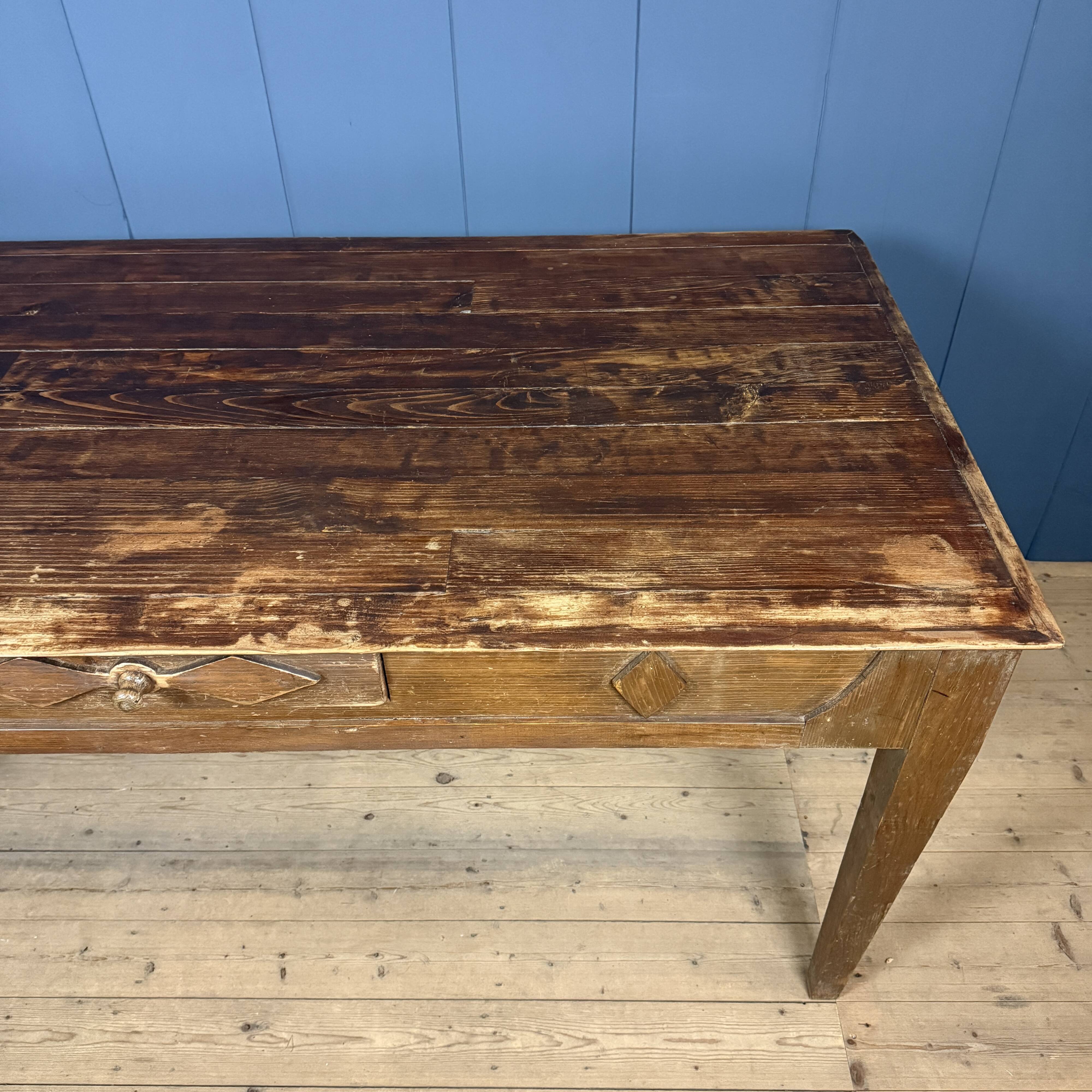 Old decorated wooden kitchen table