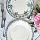 Old mismatched flat plates made of ironstone earthenware.