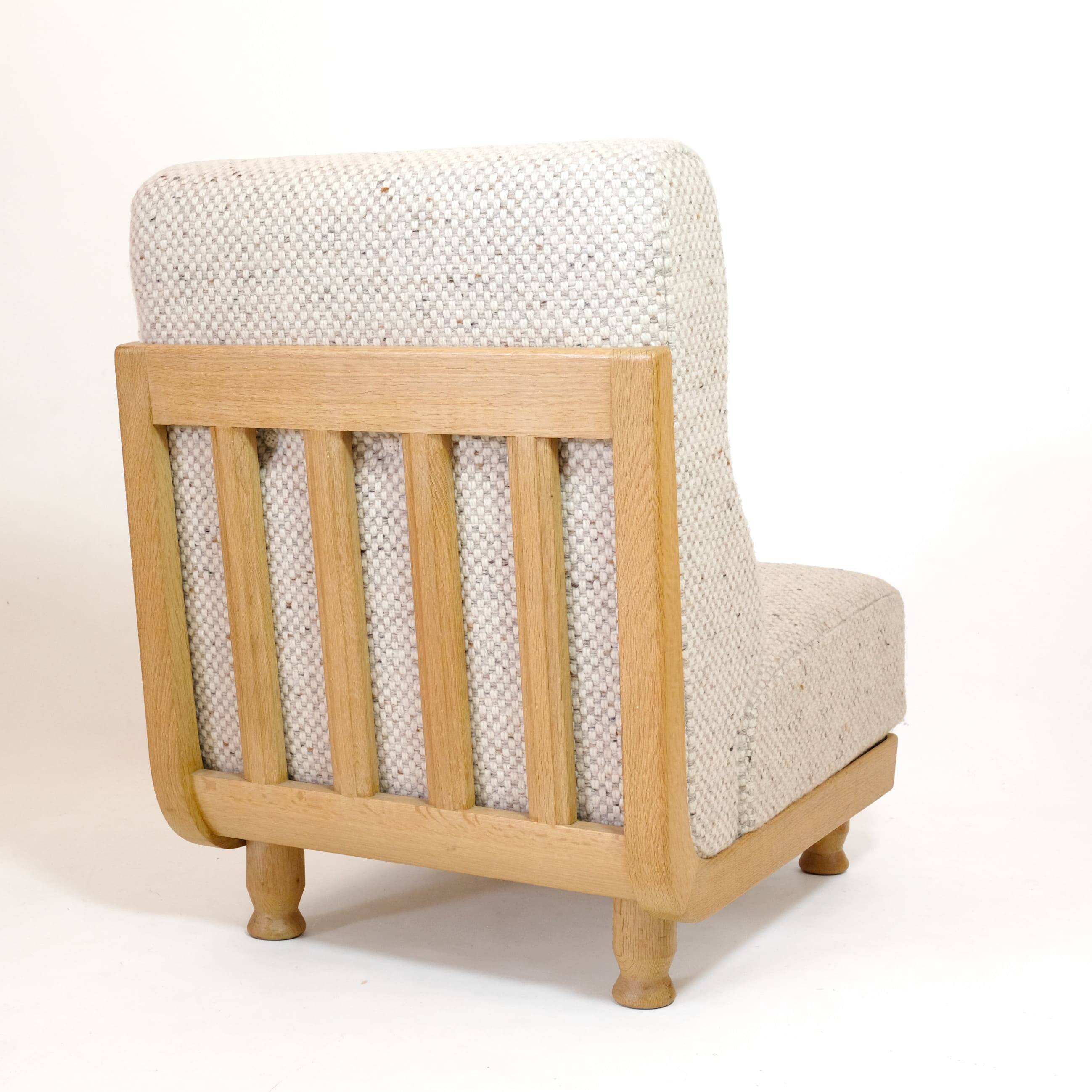 Robert Guillerme & Jacques Chambron, armchair upholstered in beige fabric.