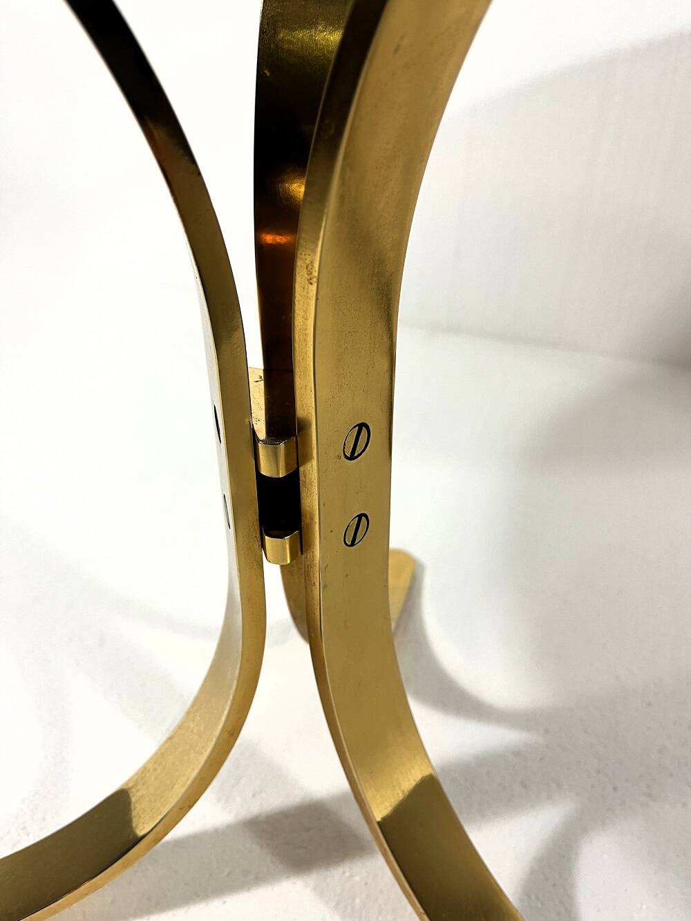 Brass and smoked glass side tables from the 1960s.