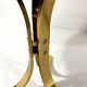 Brass and smoked glass side tables from the 1960s.