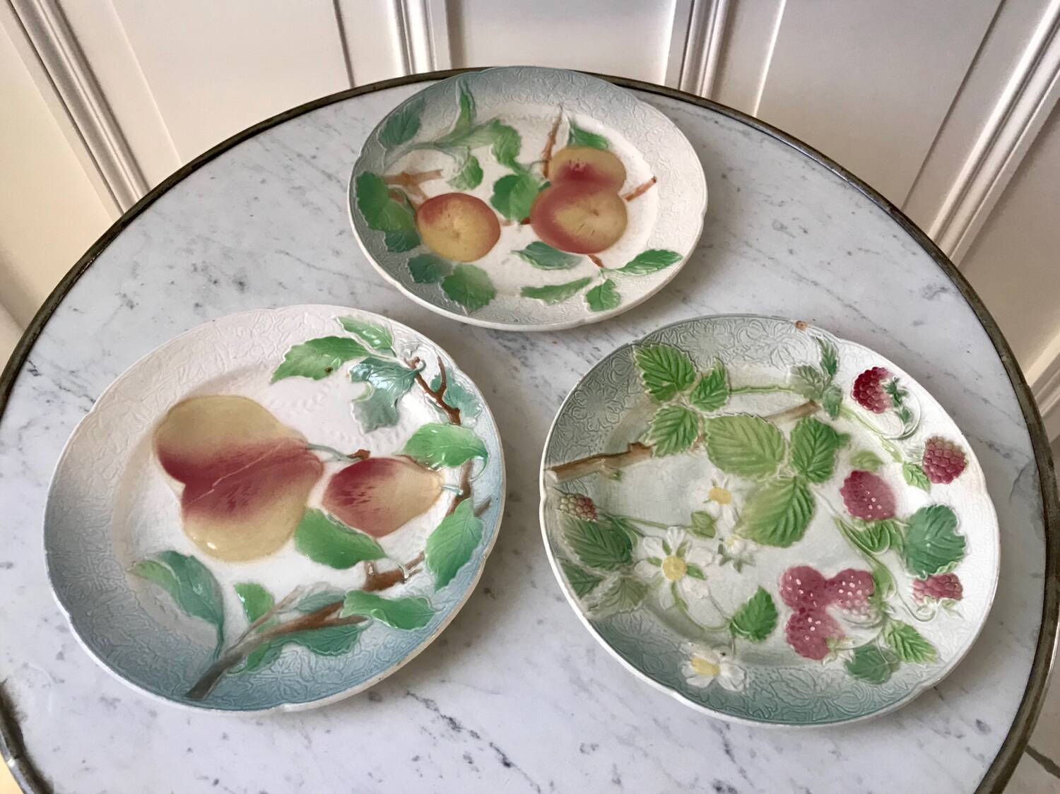 Trio of St Clement dessert plates in 19th century slip