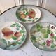 Trio of St Clement dessert plates in 19th century slip