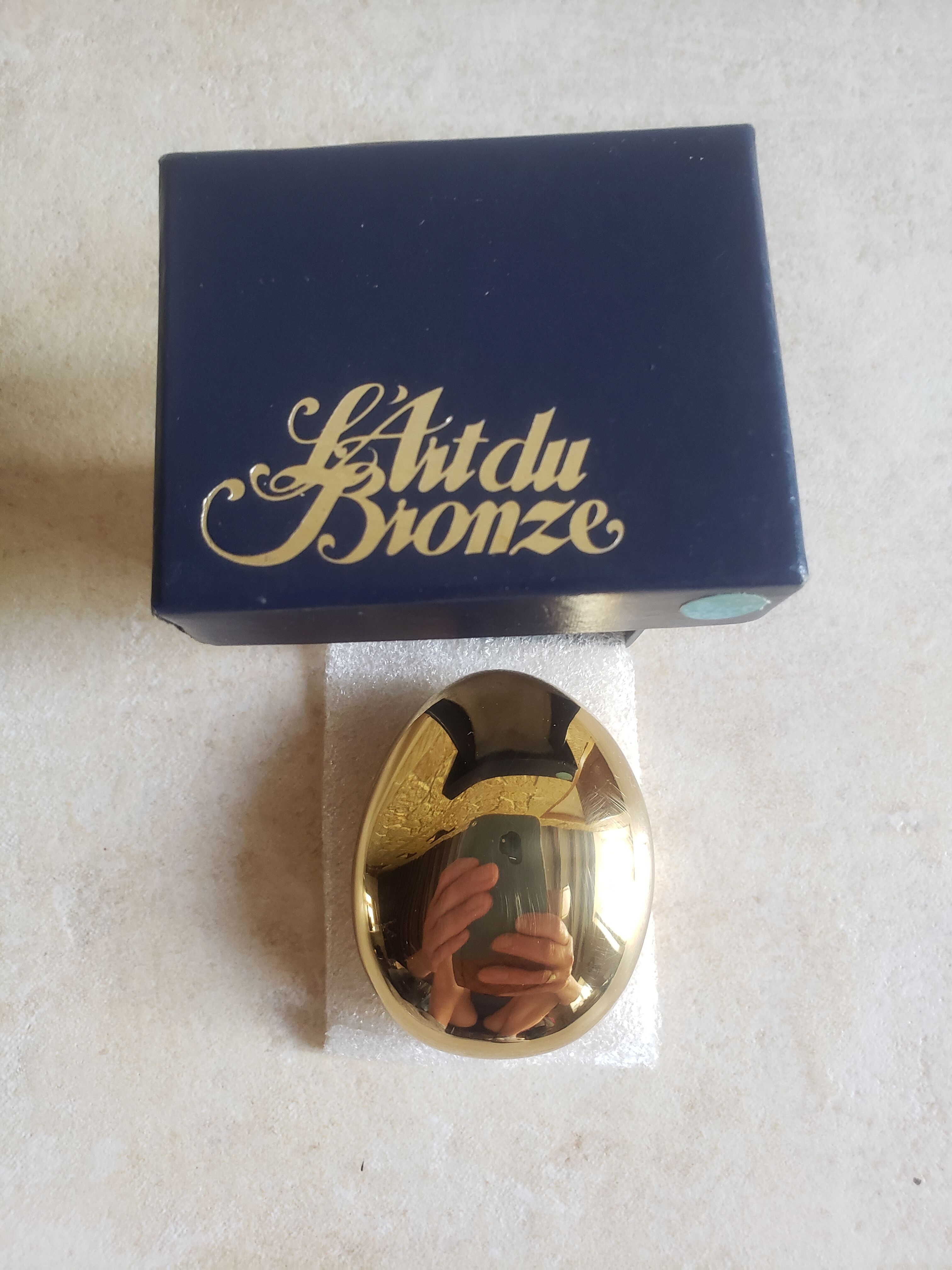 Bronze pebble decapsulator monique gerber