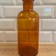 Amber glass bottle vase