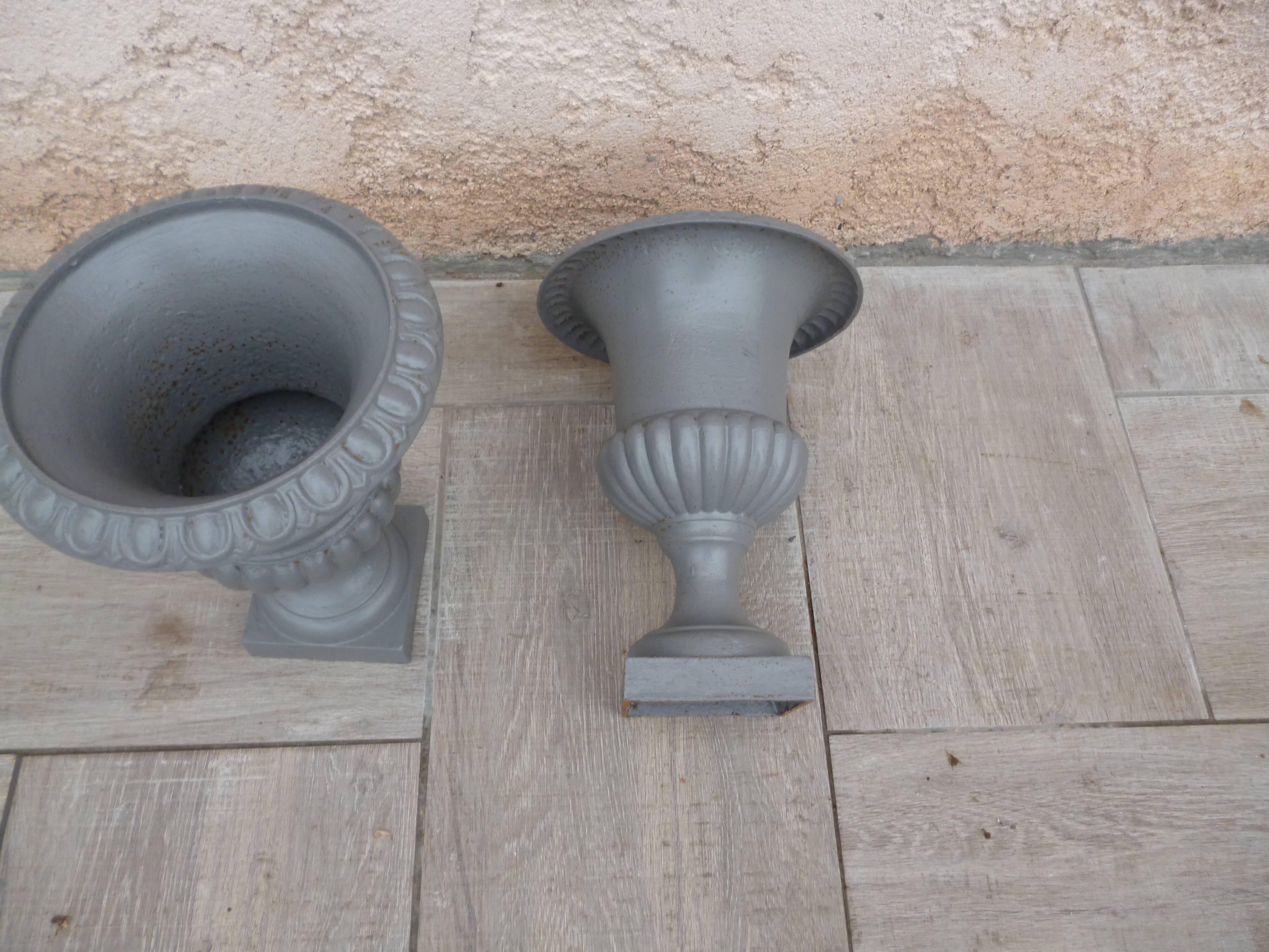 Pair of cast iron Medici vases