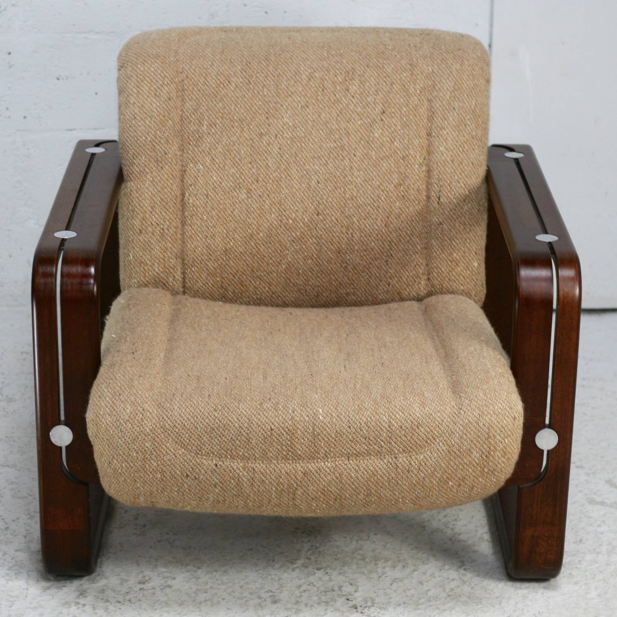 Modernist armchair. Wool, wood and steel. Circa 1970