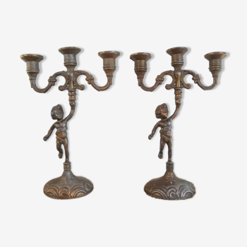 Pair of candlesticks three branches angels cherubs in regulate - vintage