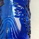 cobalt blue molded glass bottle in relief decoration bunches of grapes