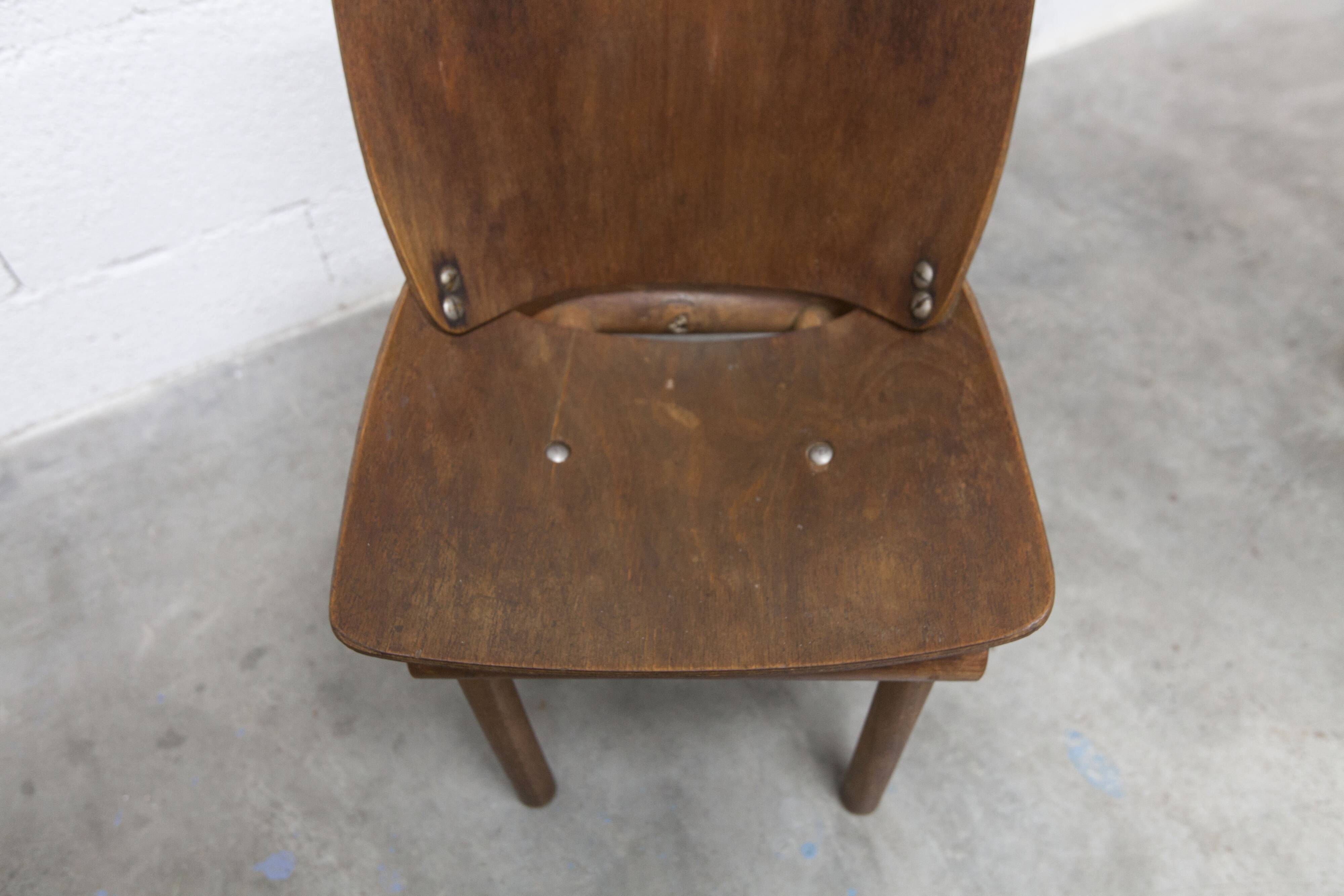 Atypical 1960s curved wood children's chair