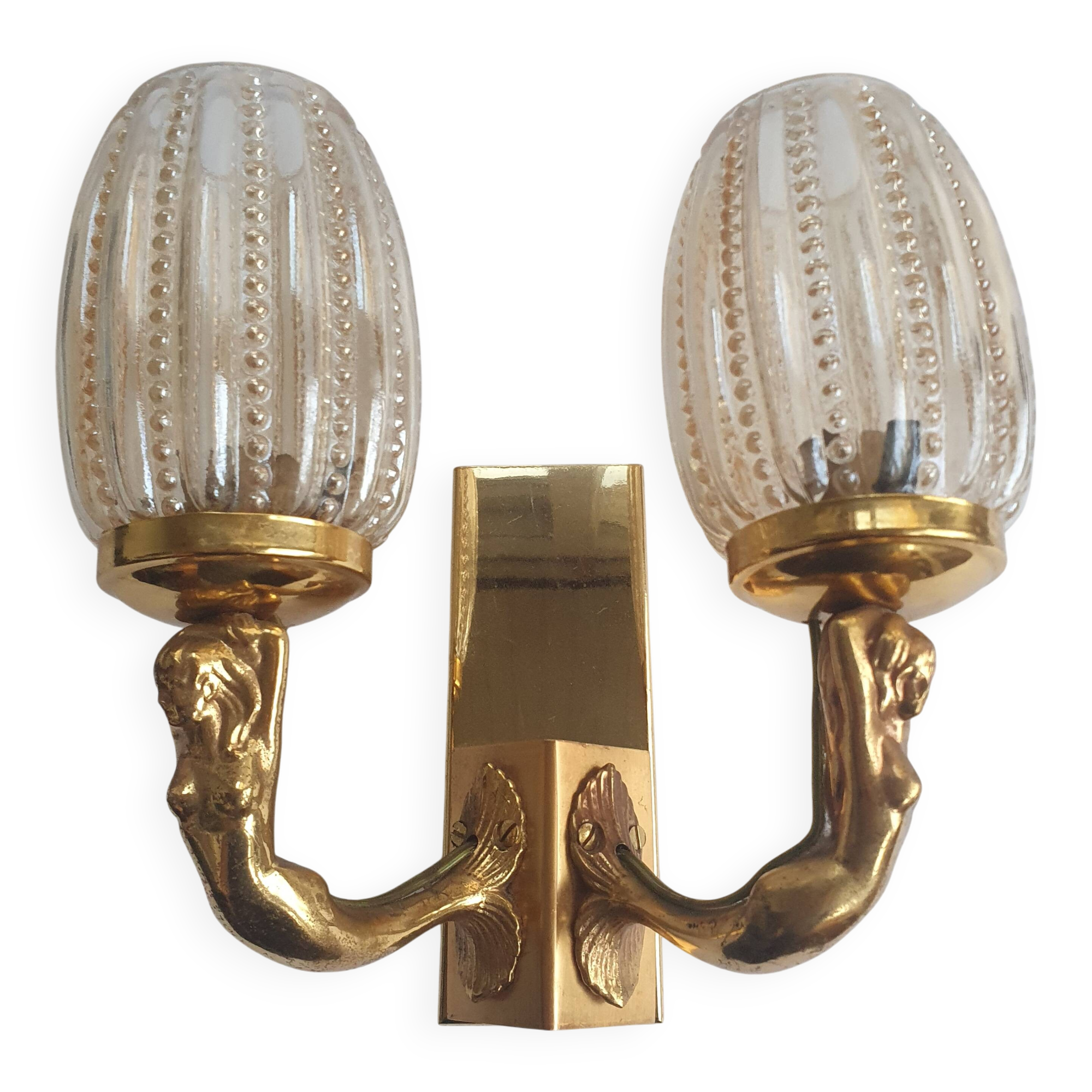 Golden bronze wall lamp with mermaids for an old bathroom.