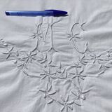 MC embroidered pillowcase with flower detailing and crocheted edge