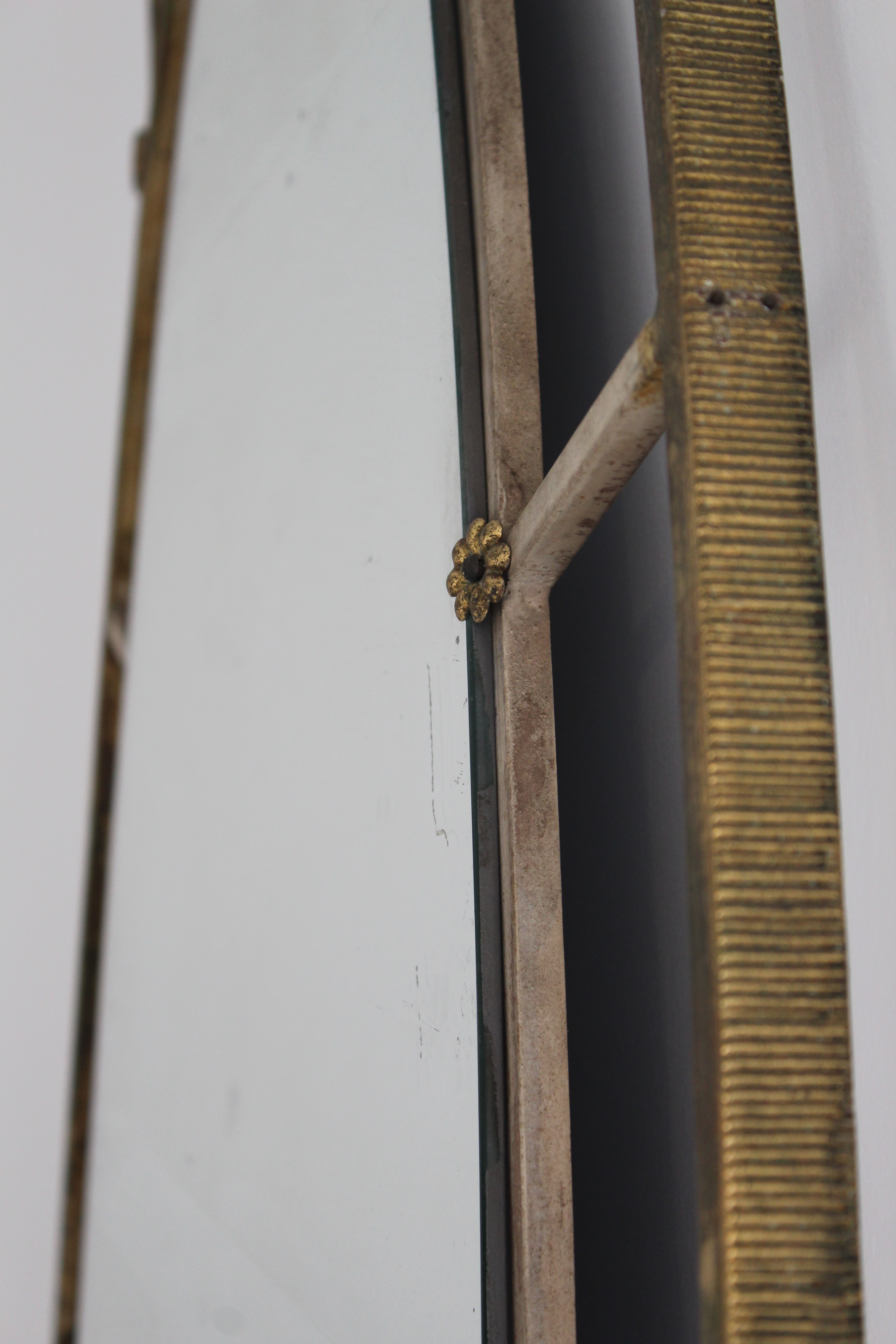 Oval mirror in art deco brass, Italy 1940s.