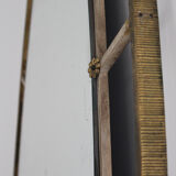 Oval mirror in art deco brass, Italy 1940s.