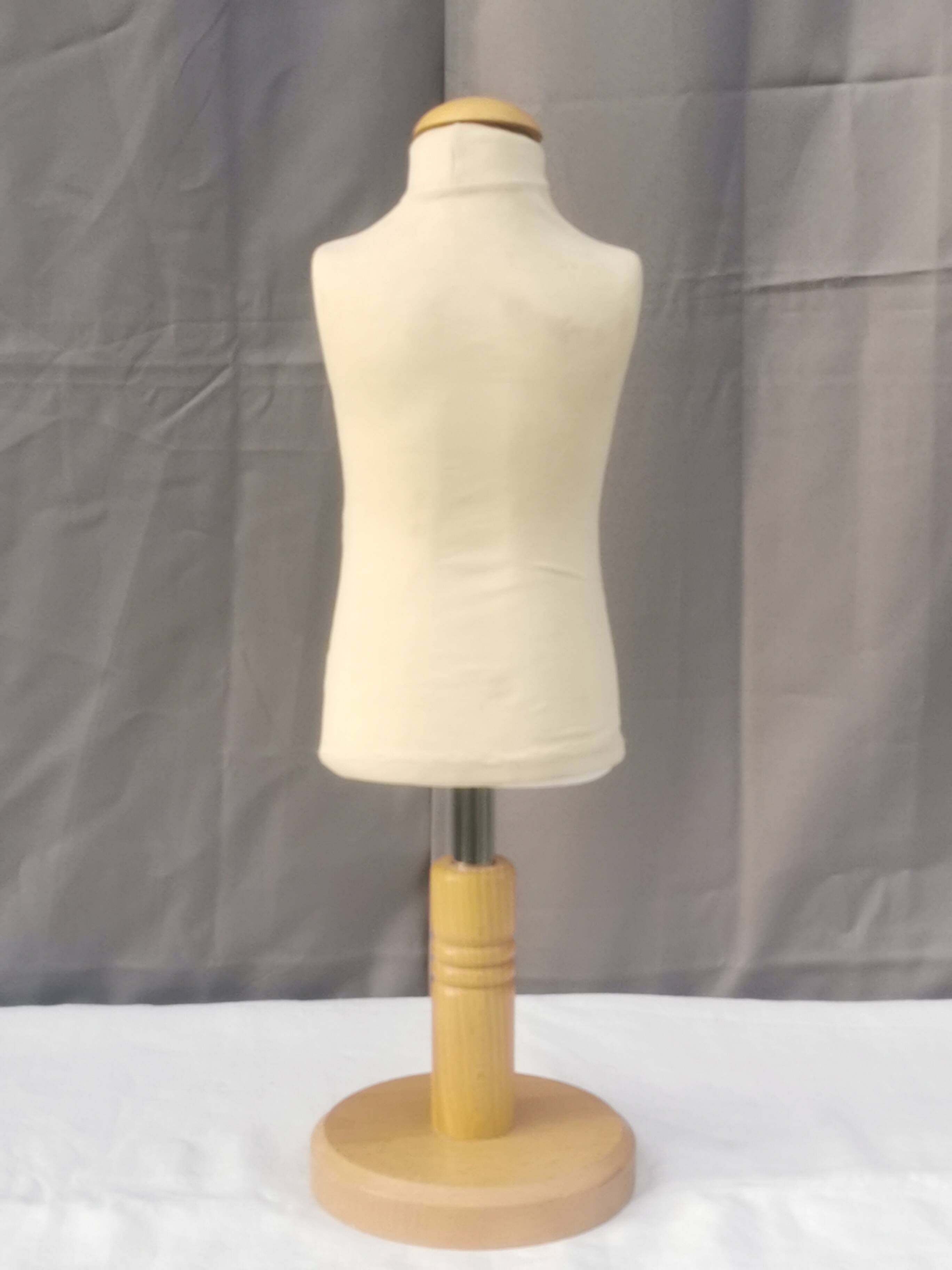 "Child bust" mannequin on base