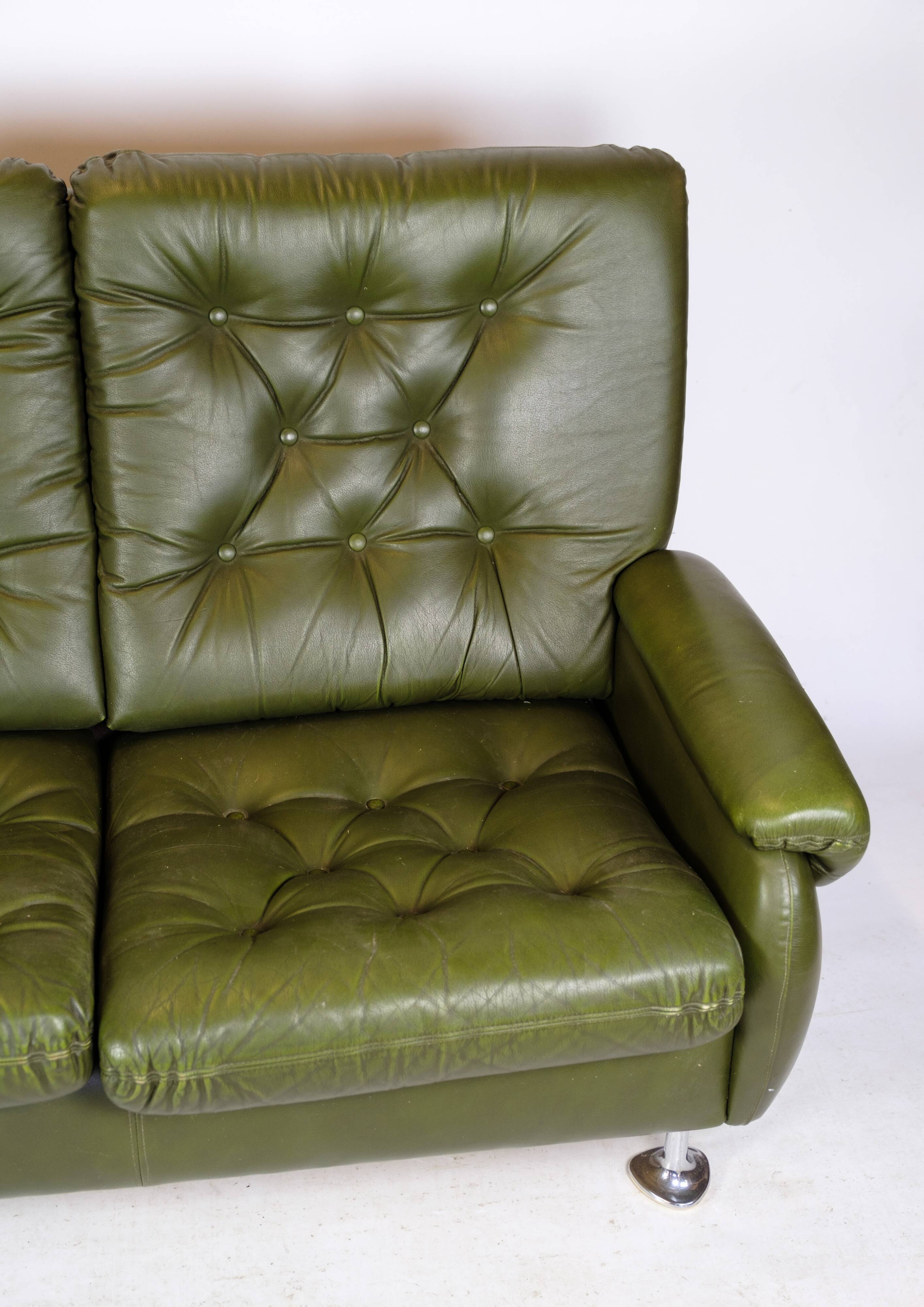 3 pers. sofa in dark green leather with chrome legs from 1970s
