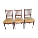 Three Louis XVI-style mahogany chairs
