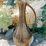 Carafe vase in chiseled brass