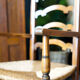 Arts & crafts solid oak ladder back occasional chair with rush seat