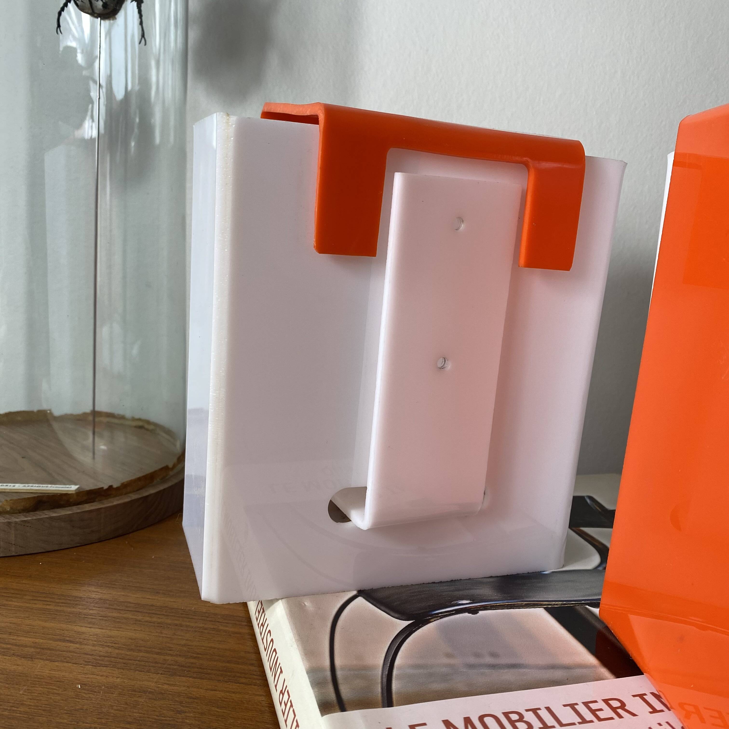 Pair of orange plexiglass wall sconces from the seventies.