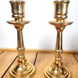 Pair of candle holders in solid gilded metal
