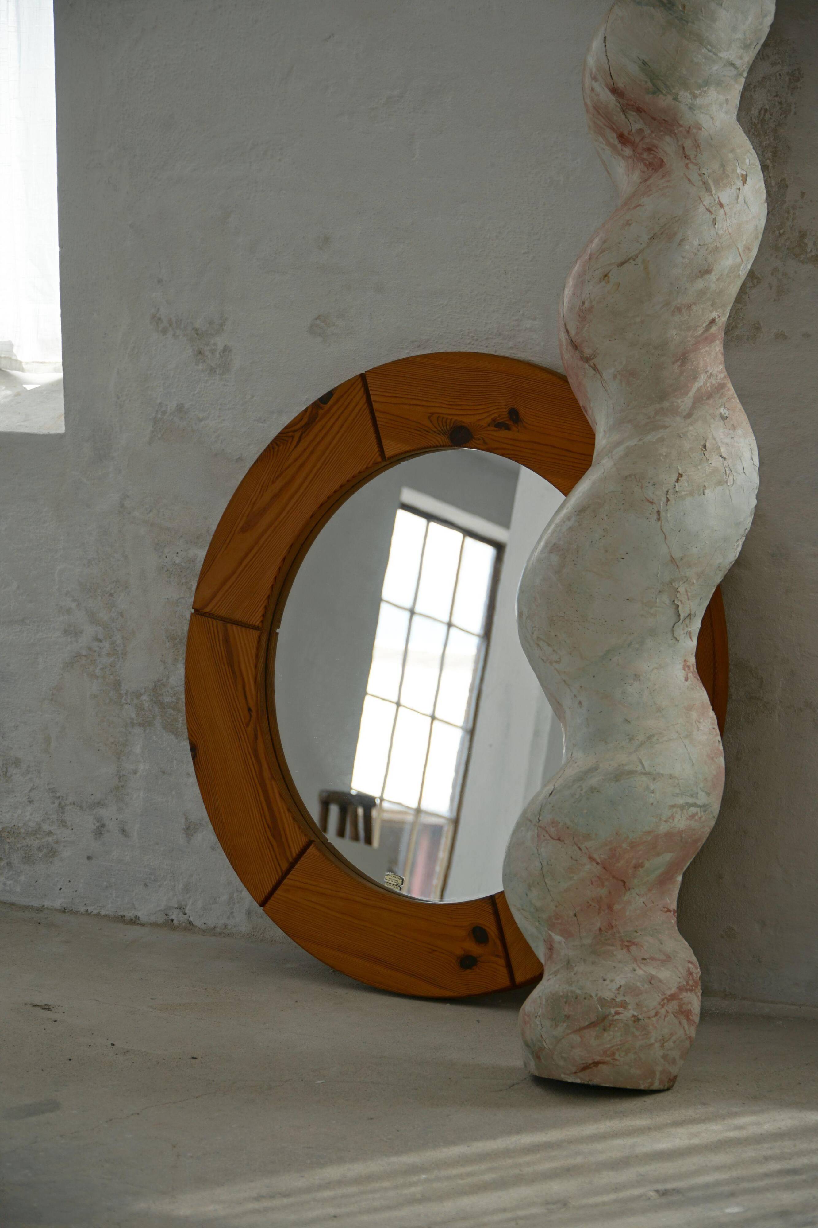 Large round wall mirror in solid pine by Glasmäster Markaryd, Sweden, 1960s.