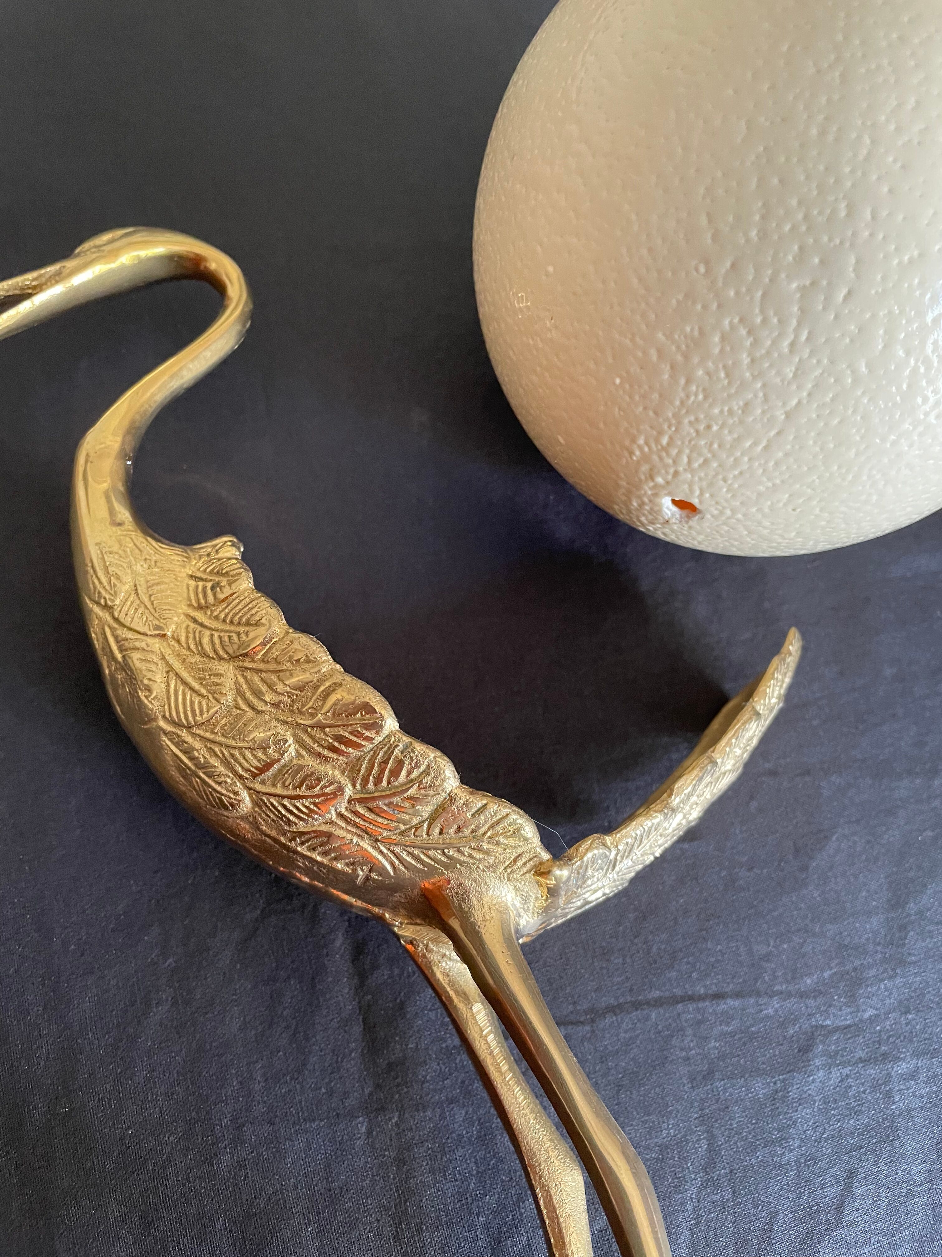 Oiseau en laiton et œuf d’autruche