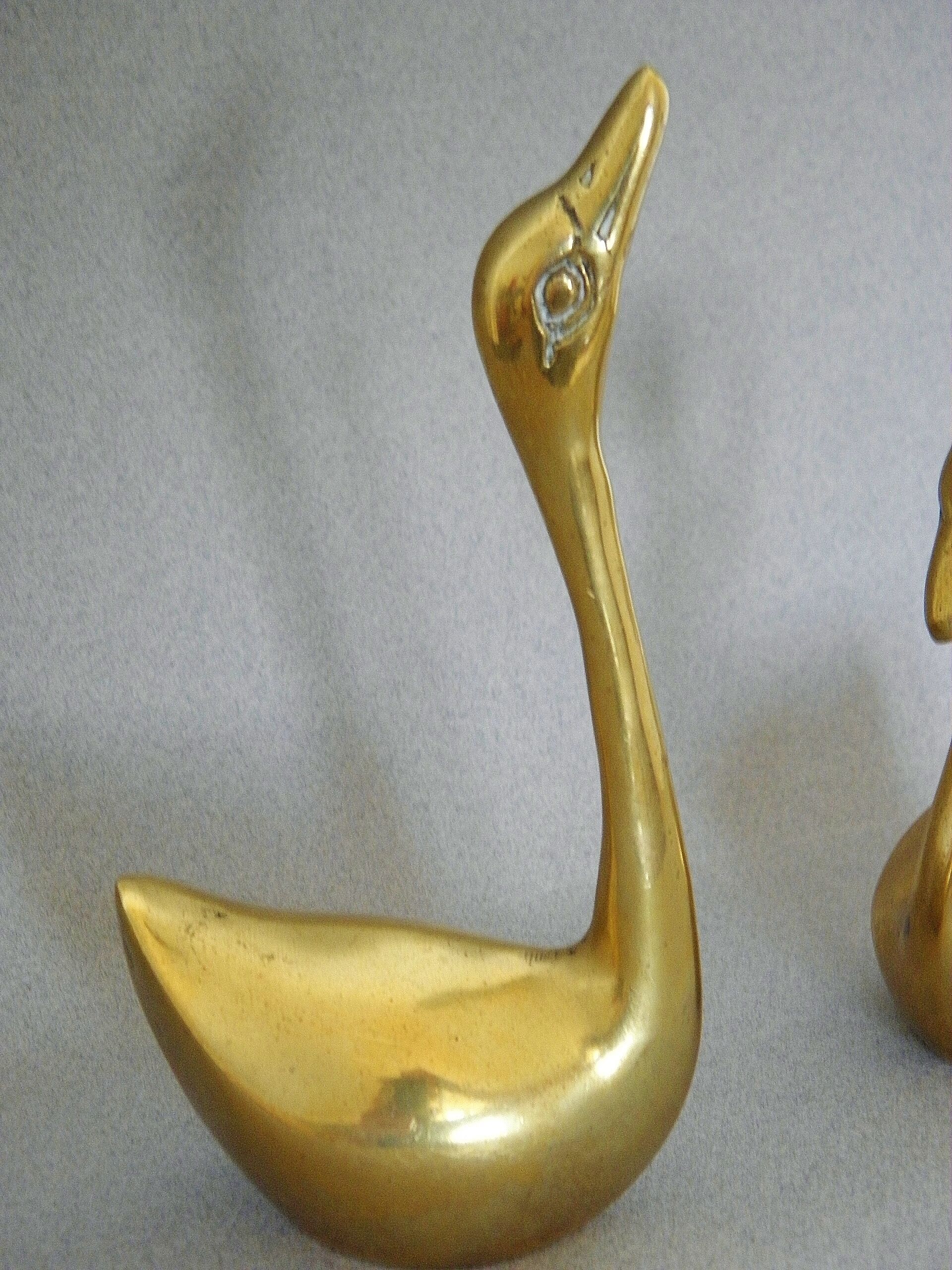 Pair of swans brass