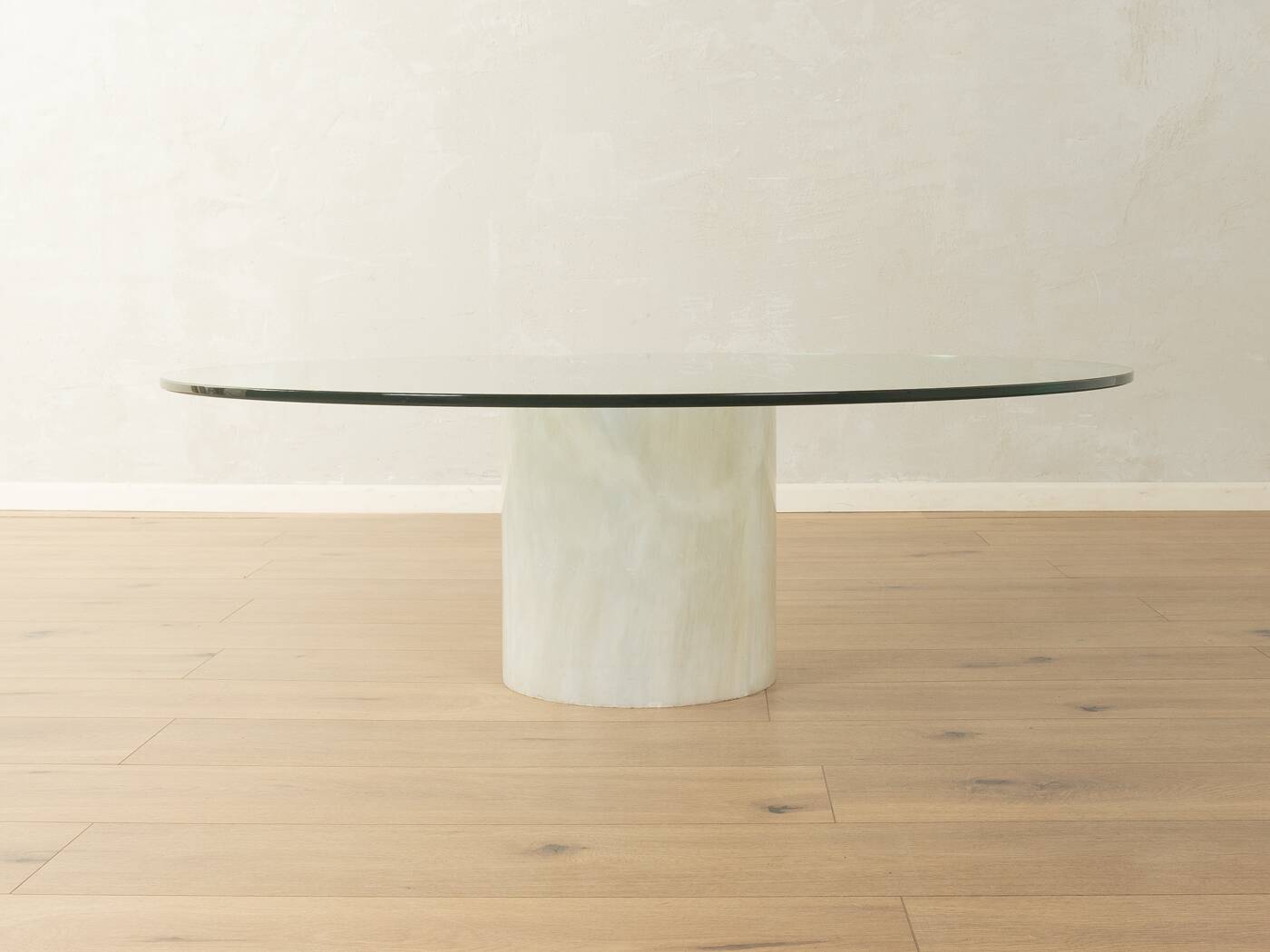 Postmodern coffee table from the 1980s with marble base and glass top