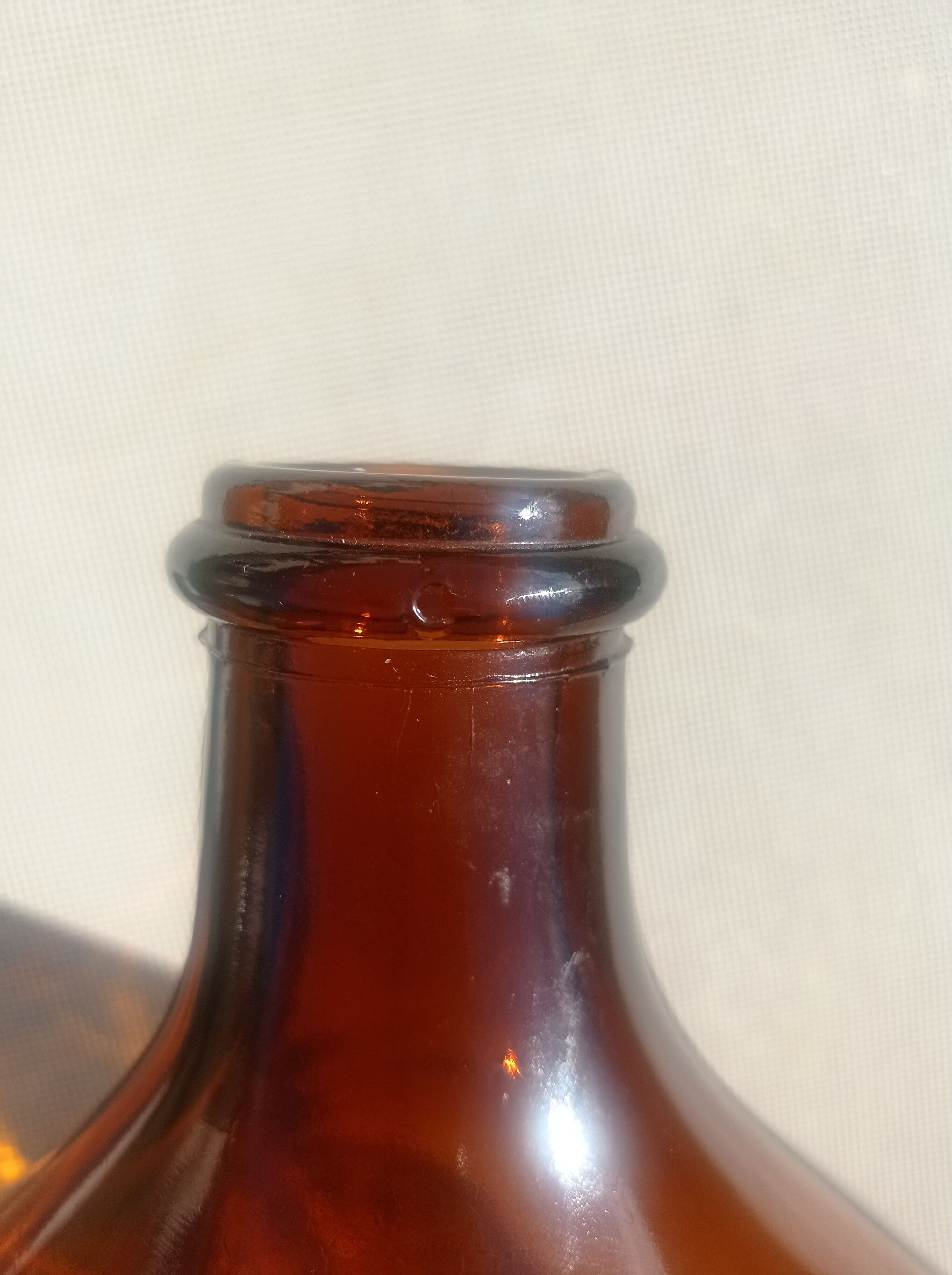 Dame jeanne 10 litres  en verre ambré