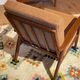 Vintage Scandinavian armchair "Theodor" in terracotta boucle.
